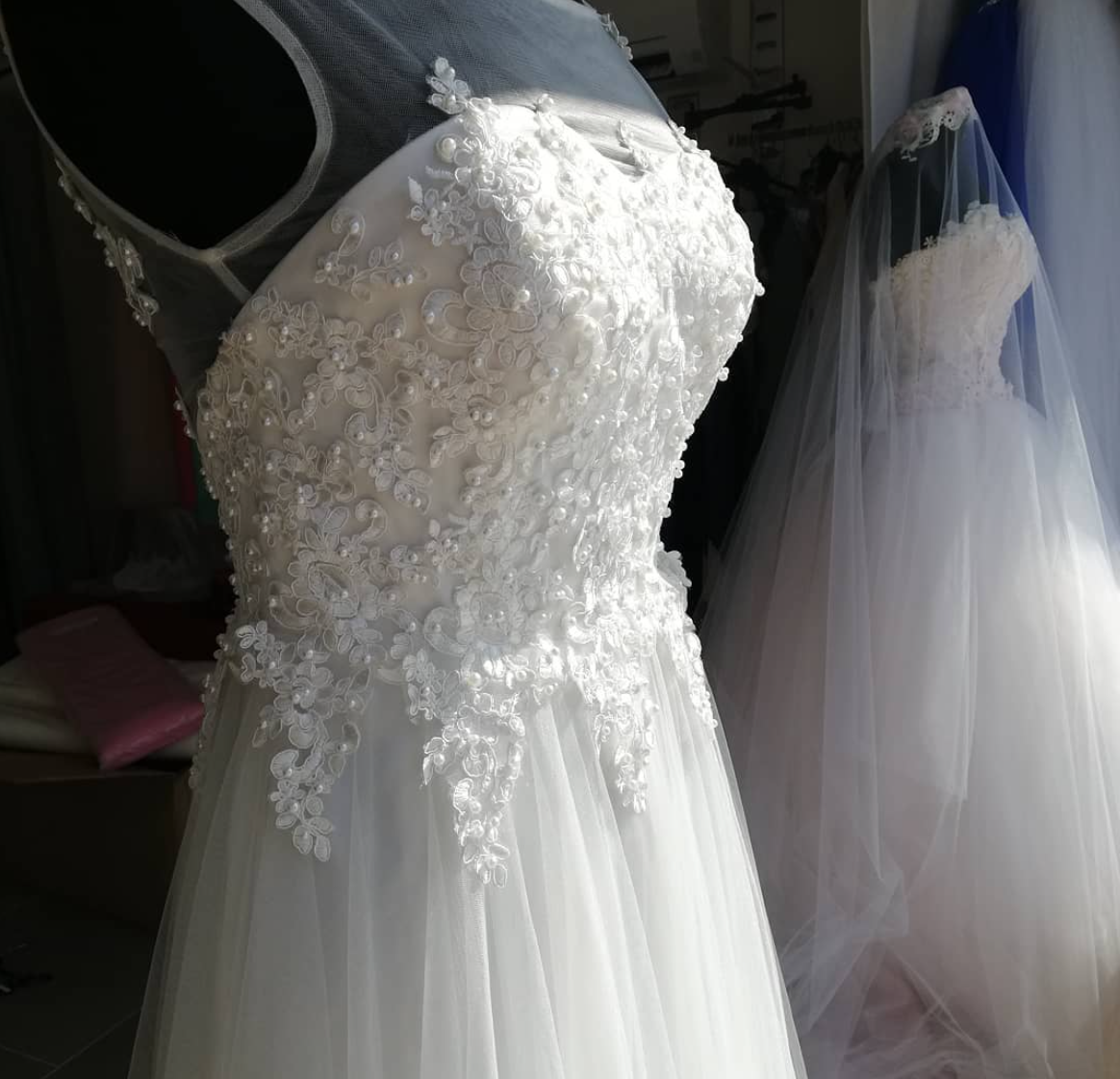 Robe de mariée dentelle en atelier